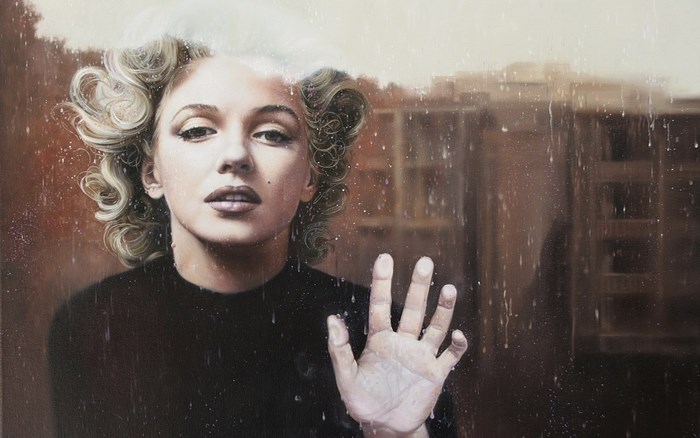 Marilyn Monroe behind a rainy window