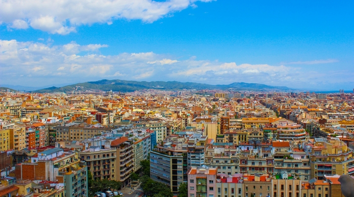 Barcelona cityscape with mountains and sky
