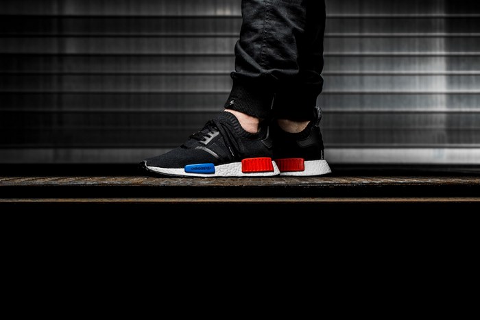 Adidas NMD R1 shoes on feet