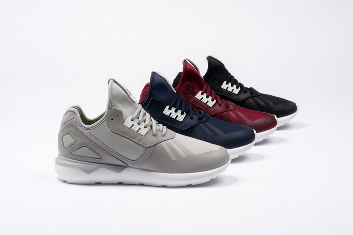 Four Adidas Tubular Runner sneakers in different colors