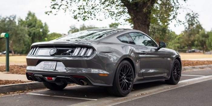 Gray Ford Mustang GT parked on a street