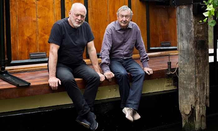 Pink Floyd Band Members Sitting Outdoors