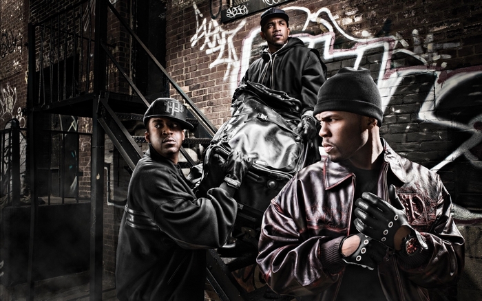 Urban Gangsters in an Alley with Graffiti