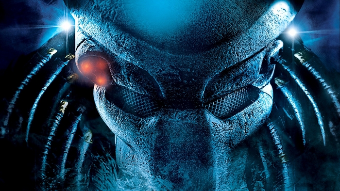 Predator mask with glowing red eyes