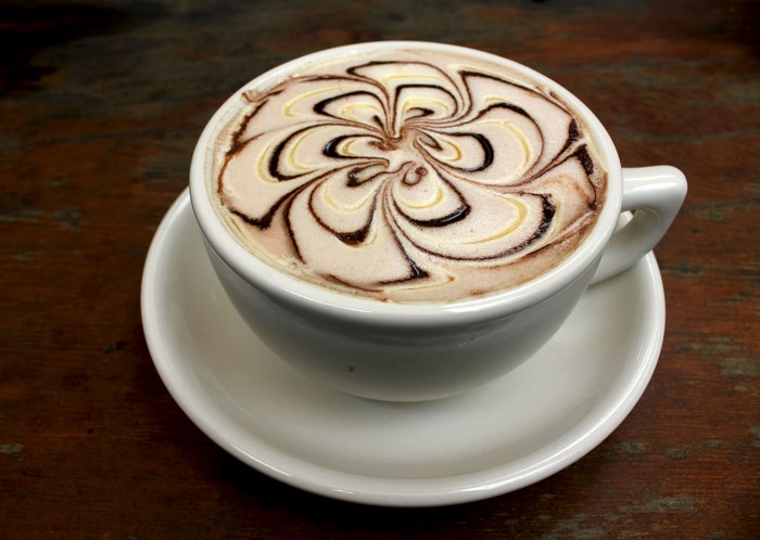 Coffee with chocolate art on top