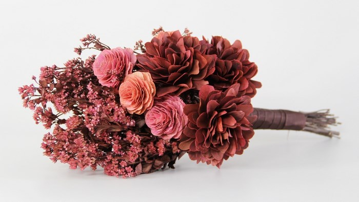 Dried flower bouquet with pink and burgundy blooms
