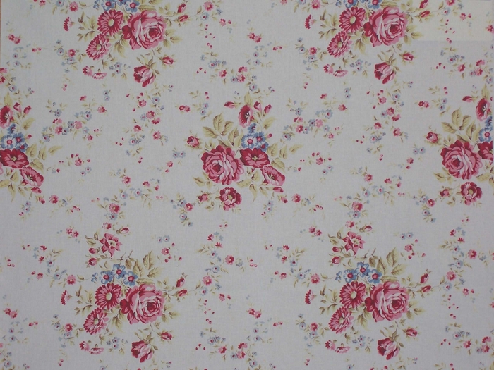 Vintage floral pattern with roses and small blue flowers