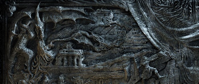 Dragon relief carving with ancient architecture