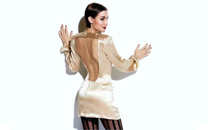 Allison Scagliotti in a gold dress