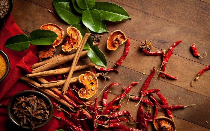 Herbs and spices on a wooden table