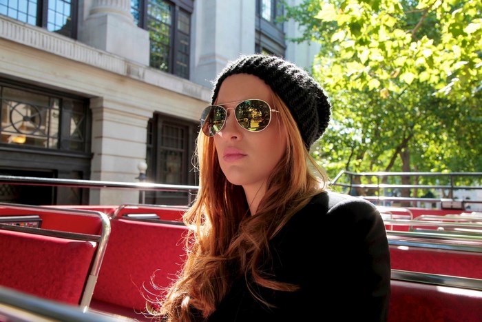 Jordan Carver on a double-decker bus