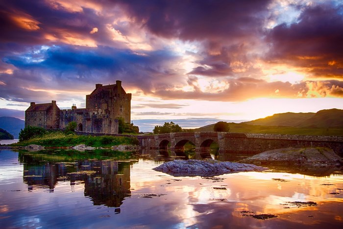 Eilean Donan Castle at sunset with reflection