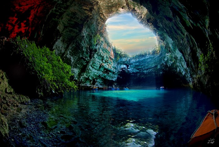Melissani Cave with boats and turquoise water