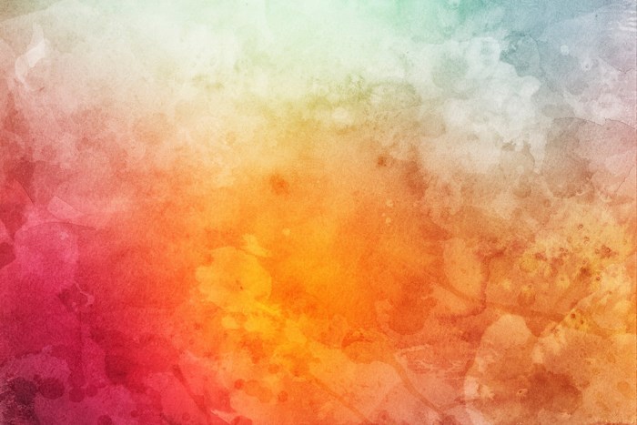 Watercolor texture with pink, orange, and teal hues