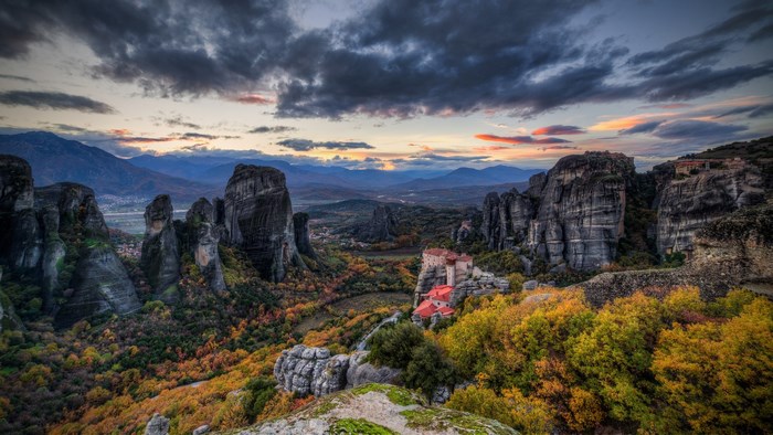 Meteora monasteries at sunset with autumn foliage