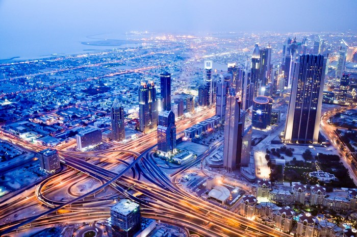 Dubai cityscape with highways at dusk