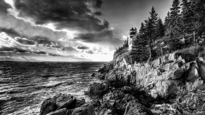 4K Lighthouse on Rocky Coastline