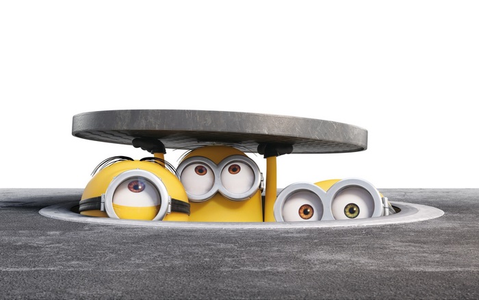 Minions peeking from a manhole