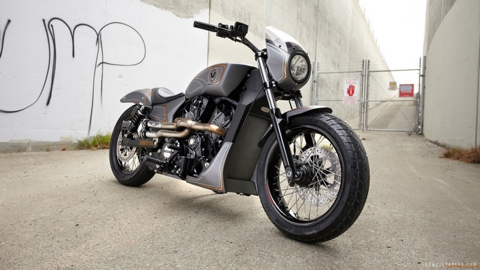 Custom motorcycle parked on concrete