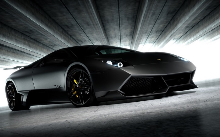 Black Lamborghini Aventador in a tunnel