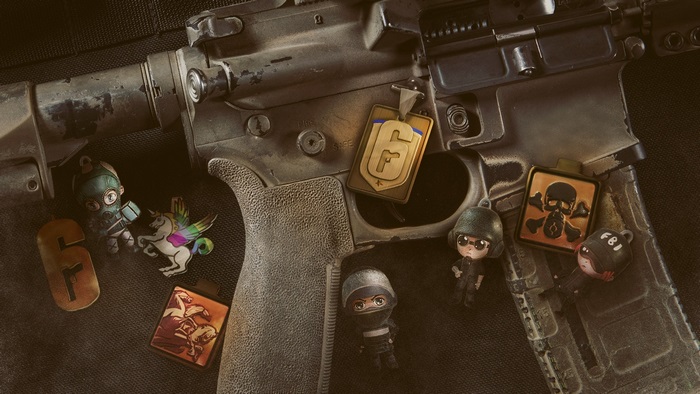 Rainbow Six Siege charms on a rifle