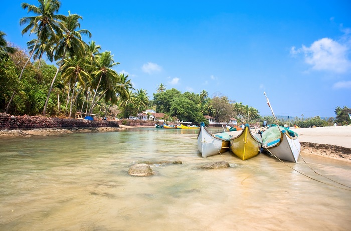 Goa 4K beach with palm trees and boats