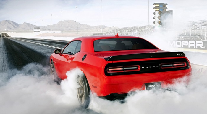 Red Dodge Challenger SRT Hellcat doing a burnout 4K