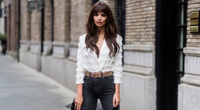 Emily Ratajkowski in white top and jeans