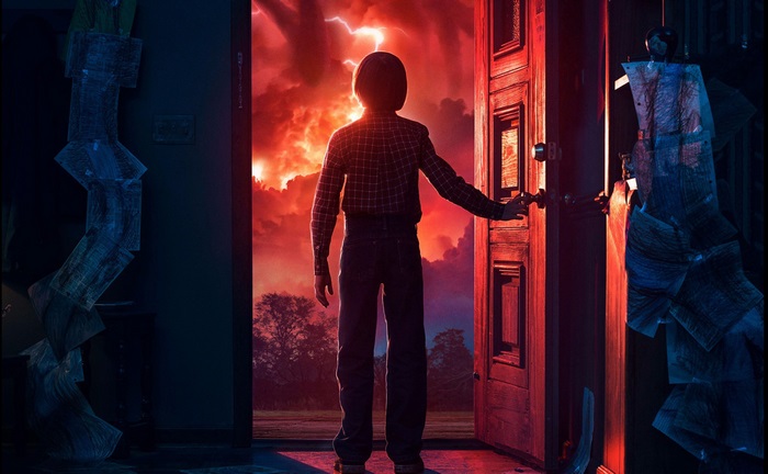 Will Byers opens a door to the Upside Down in Stranger Things