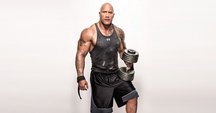 Dwayne Johnson lifting dumbbell