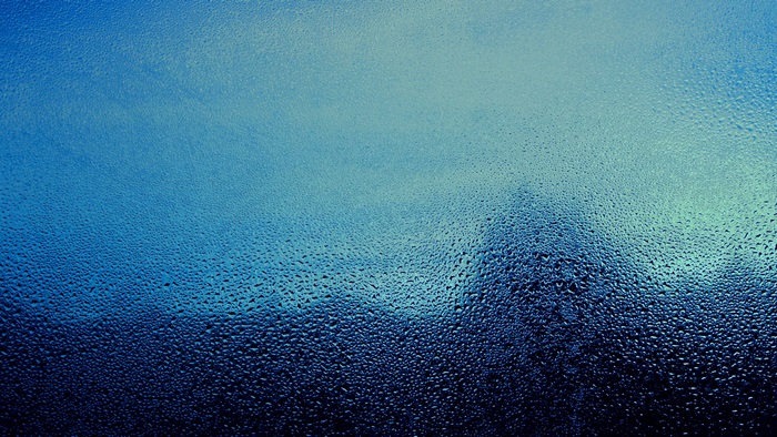 Water drops on glass 4K