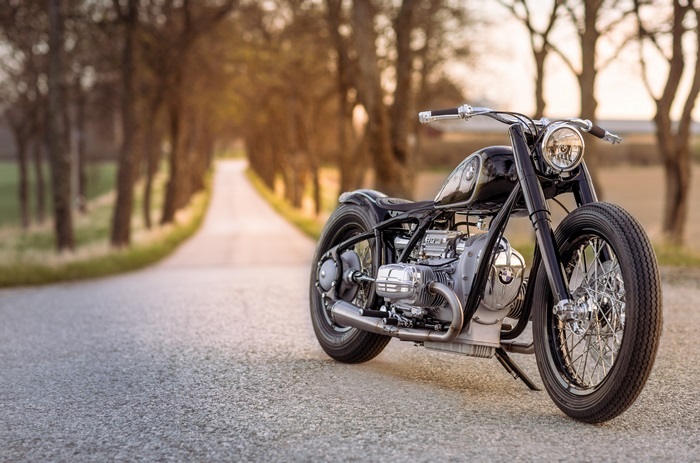 BMW R 5 Hommage motorcycle on a tree-lined road