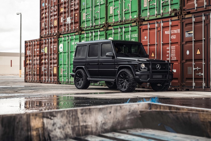 4K Mercedes-AMG G 63 parked near shipping containers