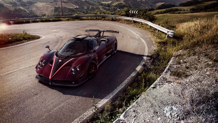 Pagani Zonda on a winding mountain road 4K
