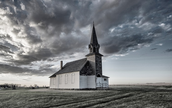 Isolated Church Under Dramatic Cloudy Sky 4K
