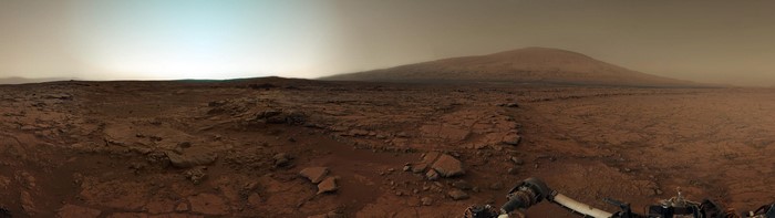 Mars landscape with a distant mountain