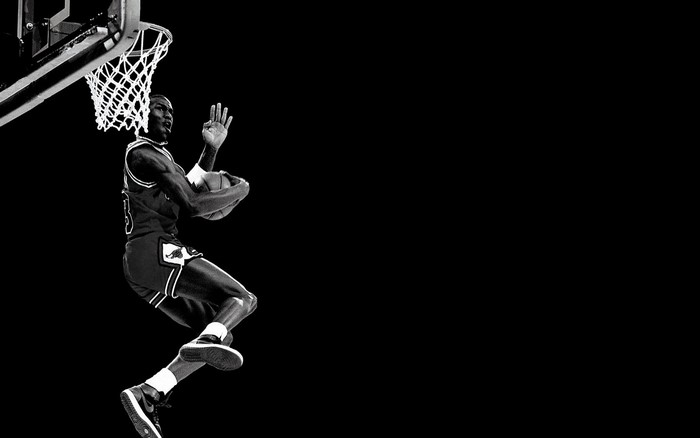 Michael Jordan of the Chicago Bulls performing a slam dunk