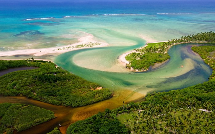 Aerial view of river estuary and tropical forest in Brazil