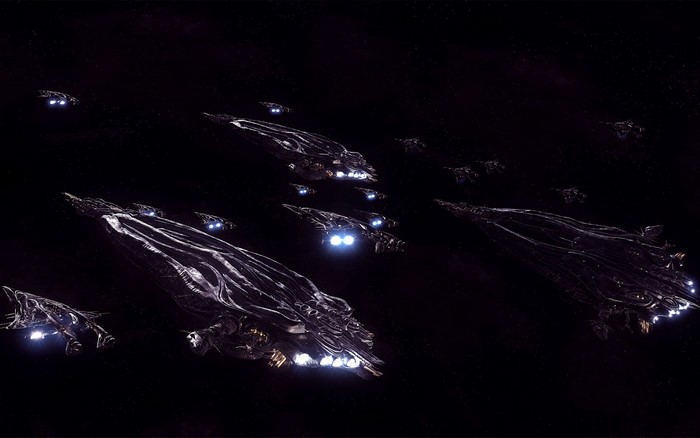 Fleet of alien spaceships in dark space