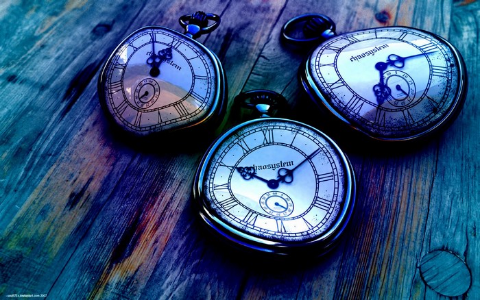Melting Pocket Watches on Wooden Surface
