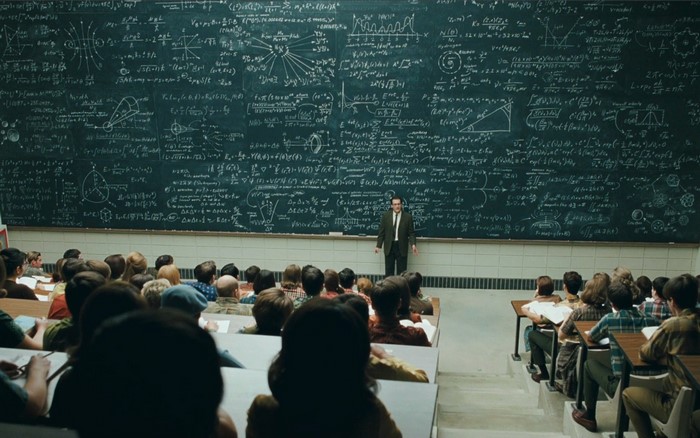 College Classroom Lecture With Professor and Students