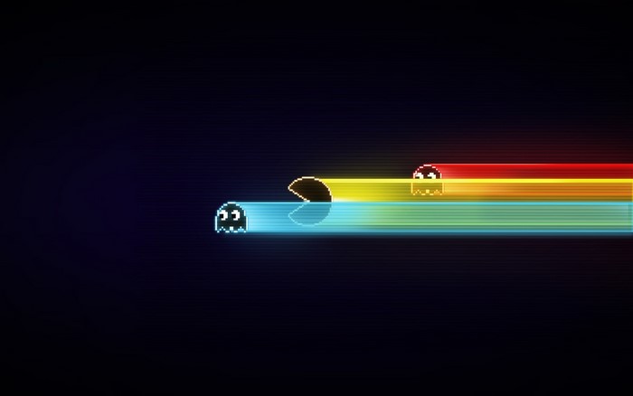 Pac-Man and ghosts with colorful light trails