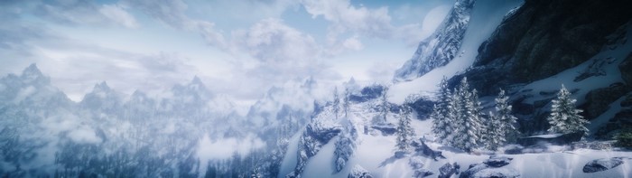 The Elder Scrolls V Skyrim landscape with snow-covered mountains
