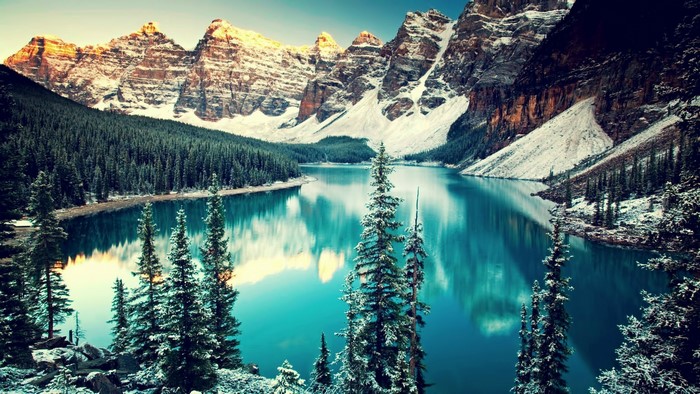 Snowy Mountains Reflecting in a Turquoise Lake in Banff National Park