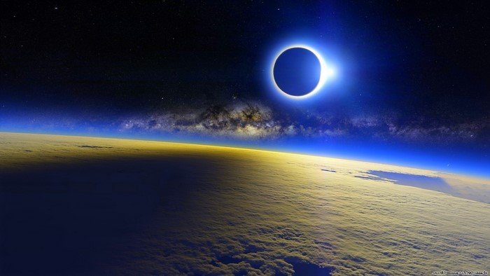 Solar Eclipse Over Earth's Atmosphere from Space