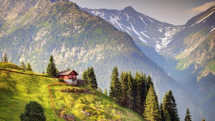 Swiss Mountain Valley with Cozy Red House