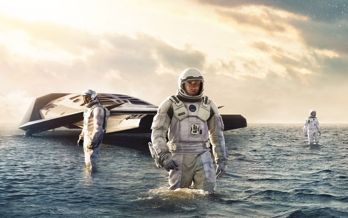 Astronauts from Interstellar in water near a spaceship