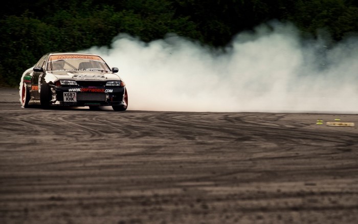 Nissan Silvia S14 drifting with smoke