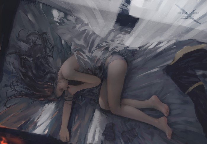 Woman sleeping on a bed
