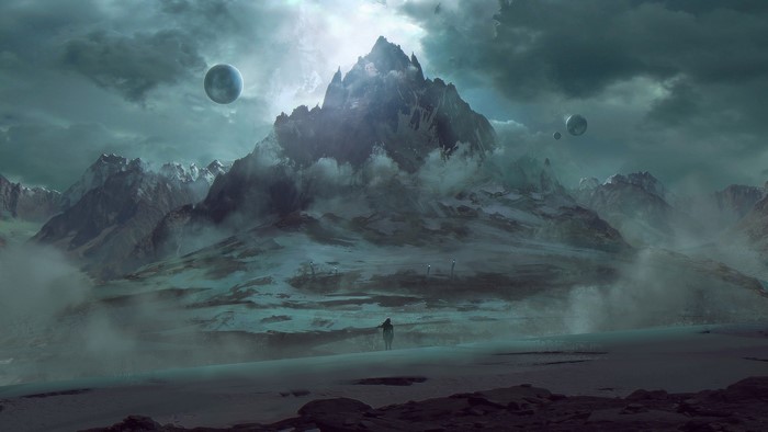 Fantasy mountain planet with moons and lone figure